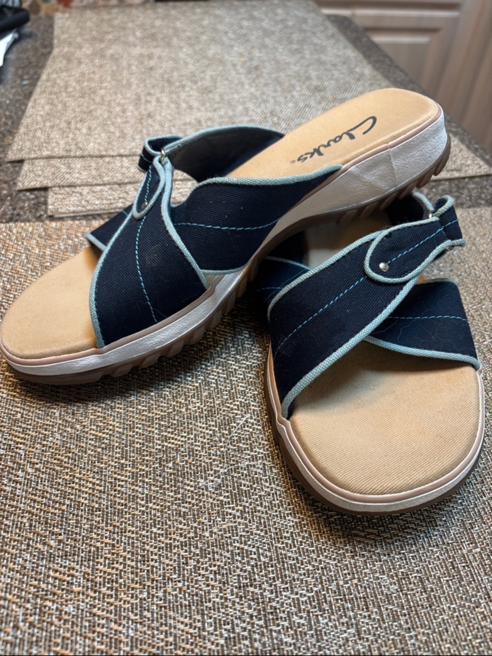 Clarks Black and Tan Cross-Strap Slide Mules